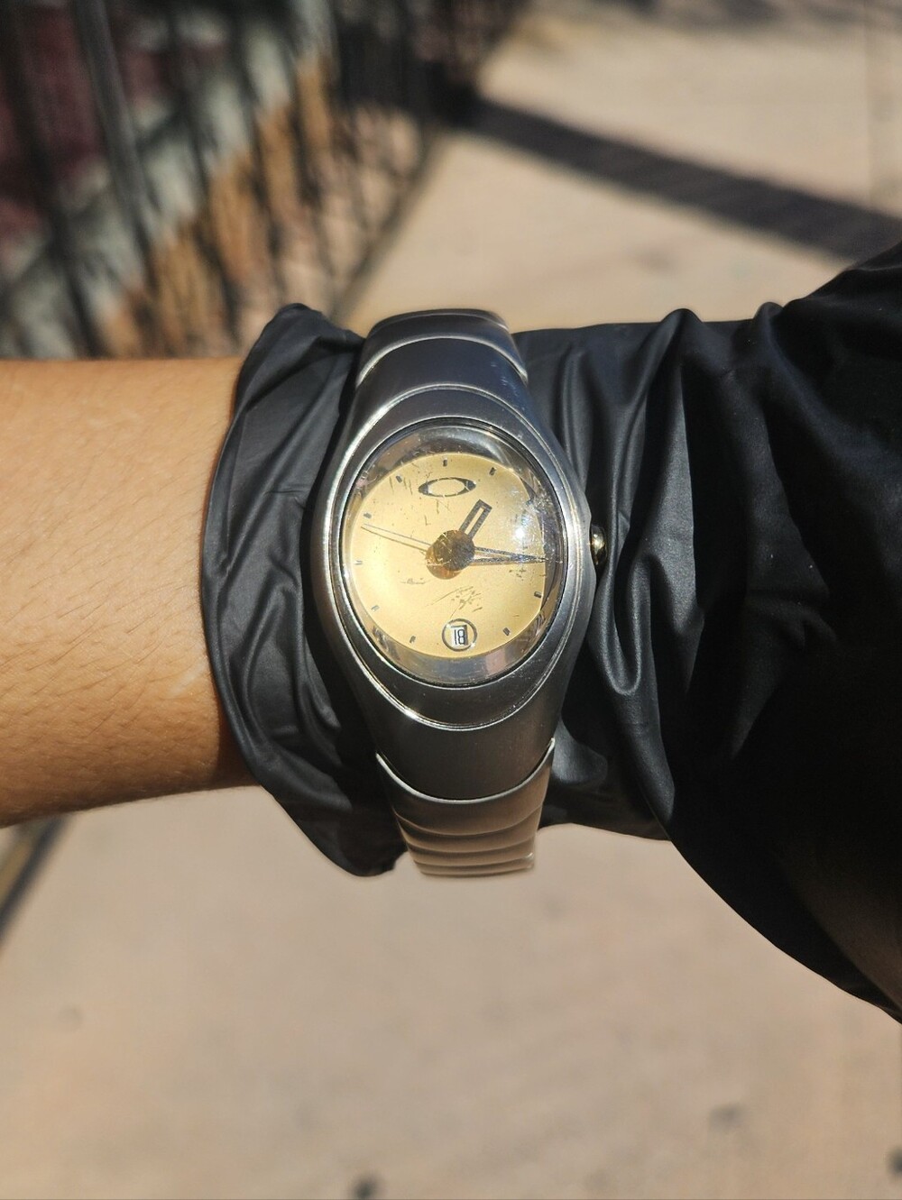 Oakley Timebomb Icon Titanium Watch with Gold Dial.